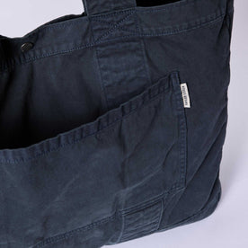 editorial image of the front pocket on The Foundation Tote in Organic Navy , Accessories by Taylor Stitch