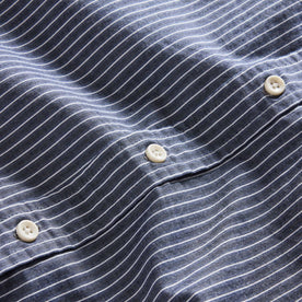 material shot of the buttons on The Jack in Rinsed Indigo Stripe, Wovens by Taylor Stitch