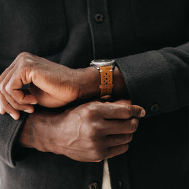 fit model adjusting the cuffs on The Maritime Shirt Jacket in Faded Black Moleskin Twill, Outerwear by Taylor Stitch