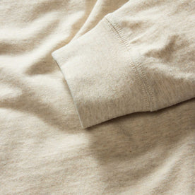 material shot of the sleeves on The Organic Cotton Henley in Heather Oat, Knits by Taylor Stitch