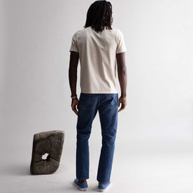 fit model showing off the back of The Organic Cotton Tee in Heather Oat, Knits by Taylor Stitch