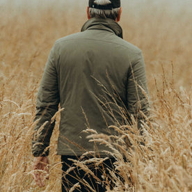 fit model showing off the back of The Ridgeline Overshirt in Fatigue Olive, Wovens by Taylor Stitch