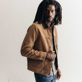 fit model posing in The Ryder Jacket in Tobacco Chipped Canvas, Outerwear by Taylor Stitch