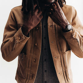 fit model adjusting the collar on The Ryder Jacket in Tobacco Chipped Canvas, Outerwear by Taylor Stitch