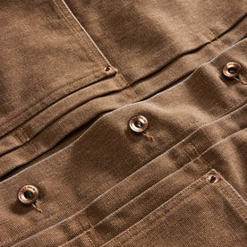 material shot of the button on The Ryder Jacket in Tobacco Chipped Canvas, Outerwear by Taylor Stitch