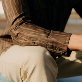 fit model showing off the cuffs on The Saddler Shirt in Bark Print Broken Twill, Wovens by Taylor Stitch