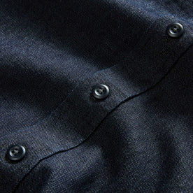 material shot of the buttons on The Saddler Shirt in Indigo Broken Twill, Wovens by Taylor Stitch