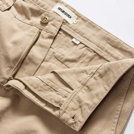 material shot of the zipper on The Slim Foundation Pant in Organic Khaki, Bottoms by Taylor Stitch