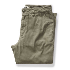 folded flatlay of The Slim Foundation Pant in Organic Smoked Olive, Bottoms by Taylor Stitch