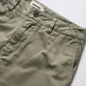 material shot of the waistband on The Slim Foundation Pant in Organic Smoked Olive, Bottoms by Taylor Stitch