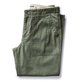 folded flatlay of The Surplus Pant in Field Olive Reverse Sateen, Bottoms by Taylor Stitch