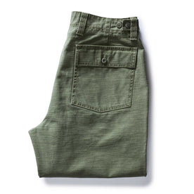 folded flatlay of the back of The Surplus Pant in Field Olive Reverse Sateen, Bottoms by Taylor Stitch