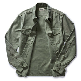 flatlay of The Surplus Shirt in Field Olive Reverse Sateen open, Wovens by Taylor Stitch