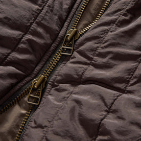 material shot of the zipper on The Able Jacket in Soil Quilted Nylon, Outerwear by Taylor Stitch