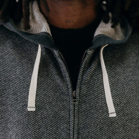 fit model showing off zipper on The Apres Zip Hoodie in Graphite French Terry Twill, Knits by Taylor Stitch