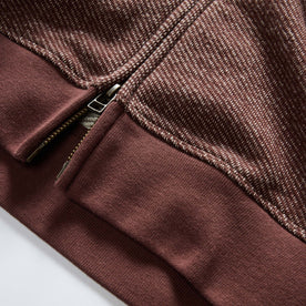 material shot of the zipper on The Apres Zip Hoodie in Merlot French Terry Twill, Knits by Taylor Stitch