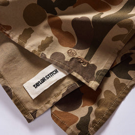 folded flatlay of the tag on The Bandana in Arid Camo, Accessories by Taylor Stitch