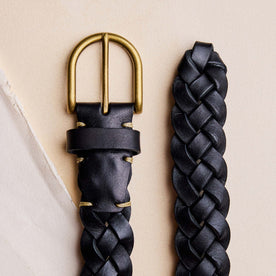 editorial flatlay of the buckle on The Braided Belt in Black, Accessories by Taylor Stitch