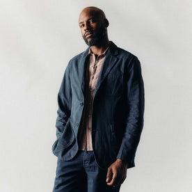 fit model posing wearing The Foundation Sportcoat in Organic Navy Twill, Outerwear by Taylor Stitch