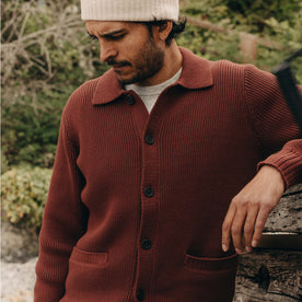 fit model posing in The Harbor Sweater Jacket in Mahogany, Knits by Taylor Stitch