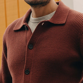 fit model showing off the buttons on The Harbor Sweater Jacket in Mahogany, Knits by Taylor Stitch