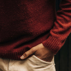 fit model with his hand in his pocket wearing The Lodge Sweater in Bonfire Donegal, Knits by Taylor Stitch