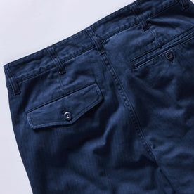 material shot of the back pocket on The Matlow Pant in Dark Navy Herringbone, Bottoms by Taylor Stitch