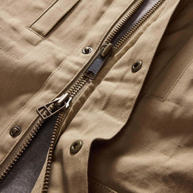 material shot of the two-way zipper on The Pathfinder Jacket in Khaki Dry Wax, Outerwear by Taylor Stitch