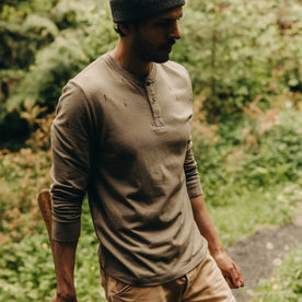 fit model posing in The Organic Cotton Henley in Sage, Knits by Taylor Stitch