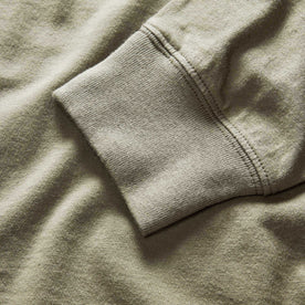 material shot of the sleeves on The Organic Cotton Henley in Sage, Knits by Taylor Stitch