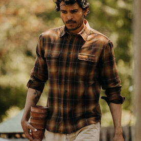 fit model walking wearing The Yosemite Shirt in Bonfire Plaid, Wovens by Taylor Stitch