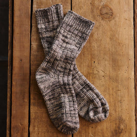 editorial flatlay of The Camp Sock in Marled Charcoal, Accessories by Taylor Stitch