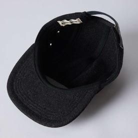 editorial image of the inside of The 5-Panel Cap in Heather Coal Wool Blend, Accessories by Taylor Stitch