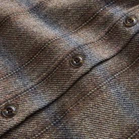 material shot of the buttons on The CPO Shirt in Dark Brick Plaid Wool, Wovens by Taylor Stitch