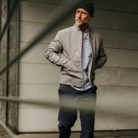 fit model walking wearing The Campus Jacket in Grey Moleskin, Outerwear by Taylor Stitch