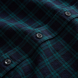 material shot of the buttons on The Jack in Blackwatch Plaid, Wovens by Taylor Stitch