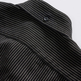 material shot of the back button on the collar on The Jack in Roped Black Indigo, Wovens by Taylor Stitch