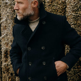 fit model with his hands in his pockets wearing The Mariner Coat in Dark Navy Wool, Outerwear by Taylor Stitch