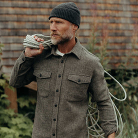 fit model holding a rope wearing The Maritime Shirt Jacket in Ash Twill, Wovens by Taylor Stitch