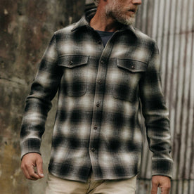 fit model posing on The Maritime Shirt Jacket in Olive Plaid, Wovens by Taylor Stitch