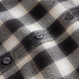 material shot of the buttons on The Moto Utility Shirt in White Smoke Plaid, Wovens by Taylor Stitch