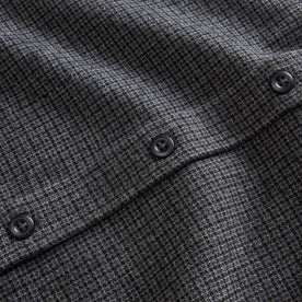 material shot of the buttons on The Saddler Shirt in Ash Check Wool, Wovens by Taylor Stitch