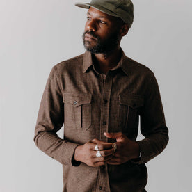 fit model posing in The Saddler Shirt in Burnt Caramel Check Wool, Wovens by Taylor Stitch