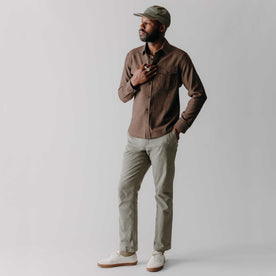 fit model with his hand in his pocket wearing The Saddler Shirt in Burnt Caramel Check Wool, Wovens by Taylor Stitch