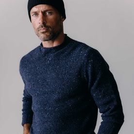 fit model posing in The Seafarer Sweater in Atlantic Blue Donegal, Knits by Taylor Stitch