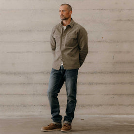 fit model posing in The Shop Shirt in Stone Chipped Canvas, Wovens by Taylor Stitch