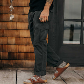 fit model walking wearing The Tommie Pant in Faded Black, Bottoms by Taylor Stitch