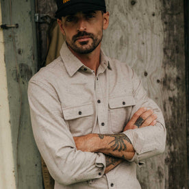 fit model with his arms crossed wearing The Yosemite Shirt in Oat Donegal, Wovens by Taylor Stitch