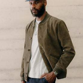 fit model posing in The Bomber Jacket in Army Suede, Outerwear by Taylor Stitch