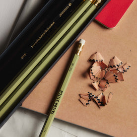 editorial image of The Cedar Hex Pencil (12-Pack) next to pencil shavings, Accessories by Taylor Stitch